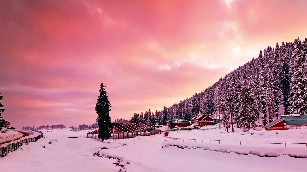 Snowy peaks over a valley